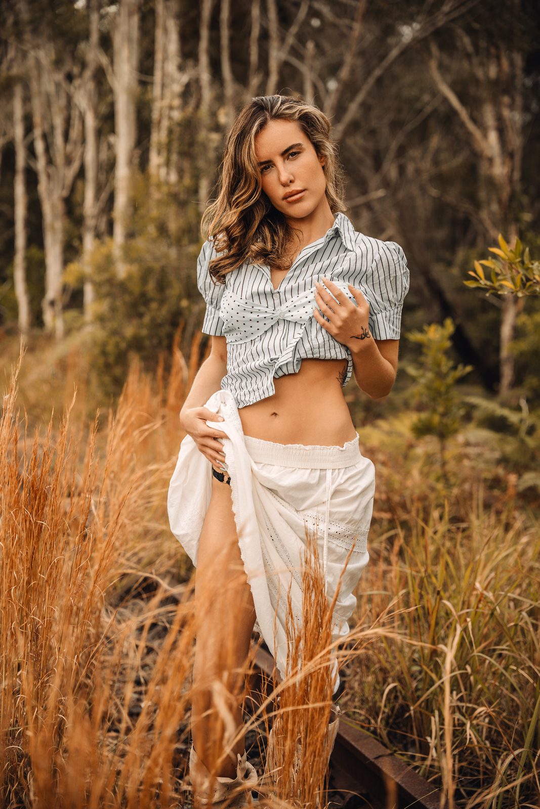 Outdoor boudoir portrait at golden hour in the Northern Rivers